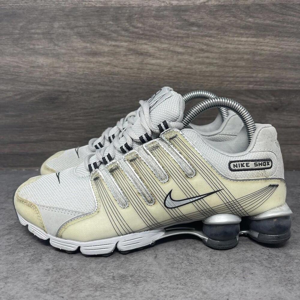 Nike Women’s Shox Athletic Sneakers in White and Light Yellow